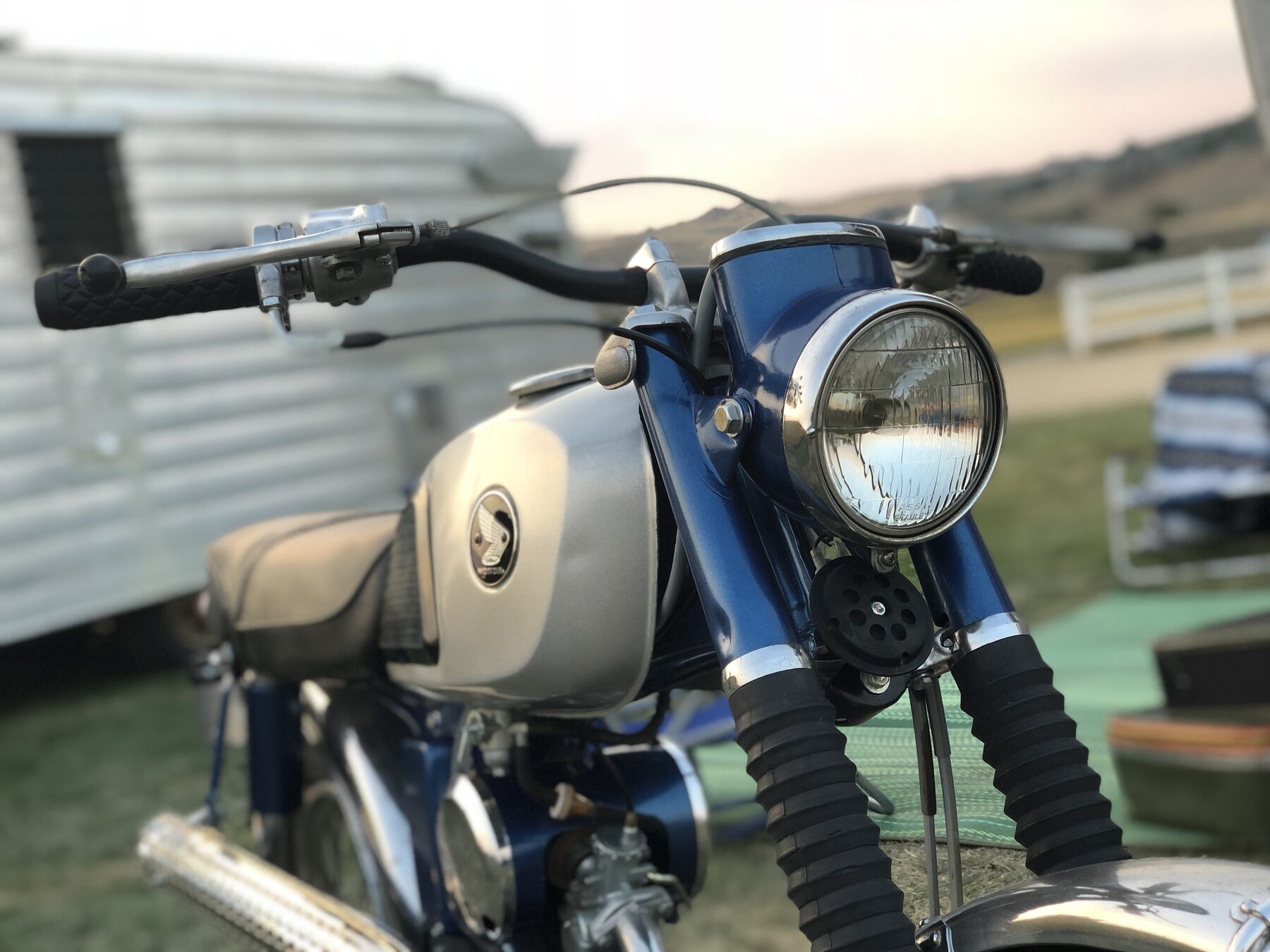 CL90 headlight and tank at dusk
