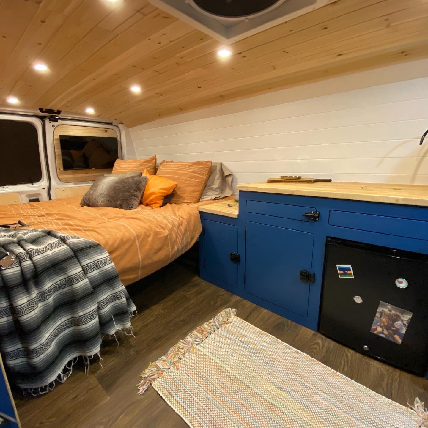 Bed and galley in the finished van
