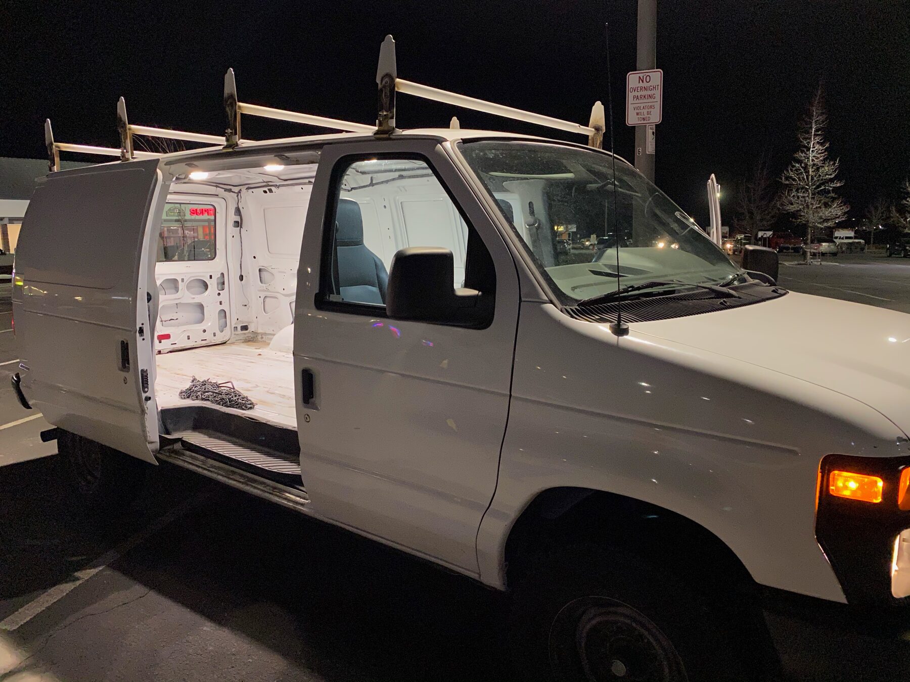 Empty Ford van interior at night